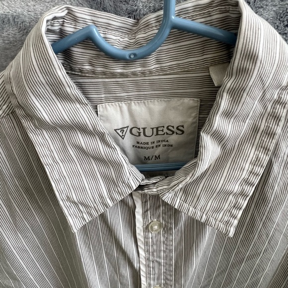 gray and white short sleeve Guess button down shirt